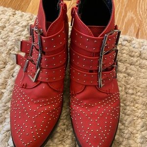 Red studded ankle boots